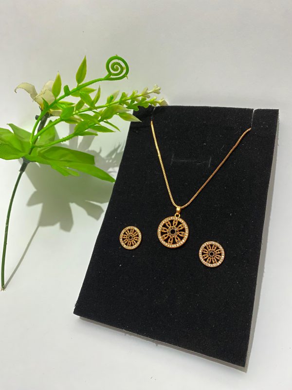 gold-plated set featuring Zircon green studs and a matching pendant